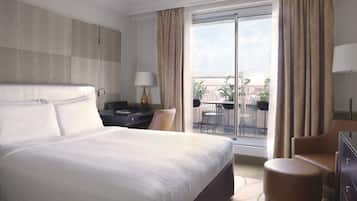 Premium bedding, down comforters, pillowtop beds, minibar