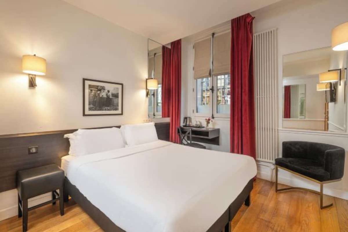 Luxe beddengoed, een laptopwerkplek, gratis wifi, beddengoed