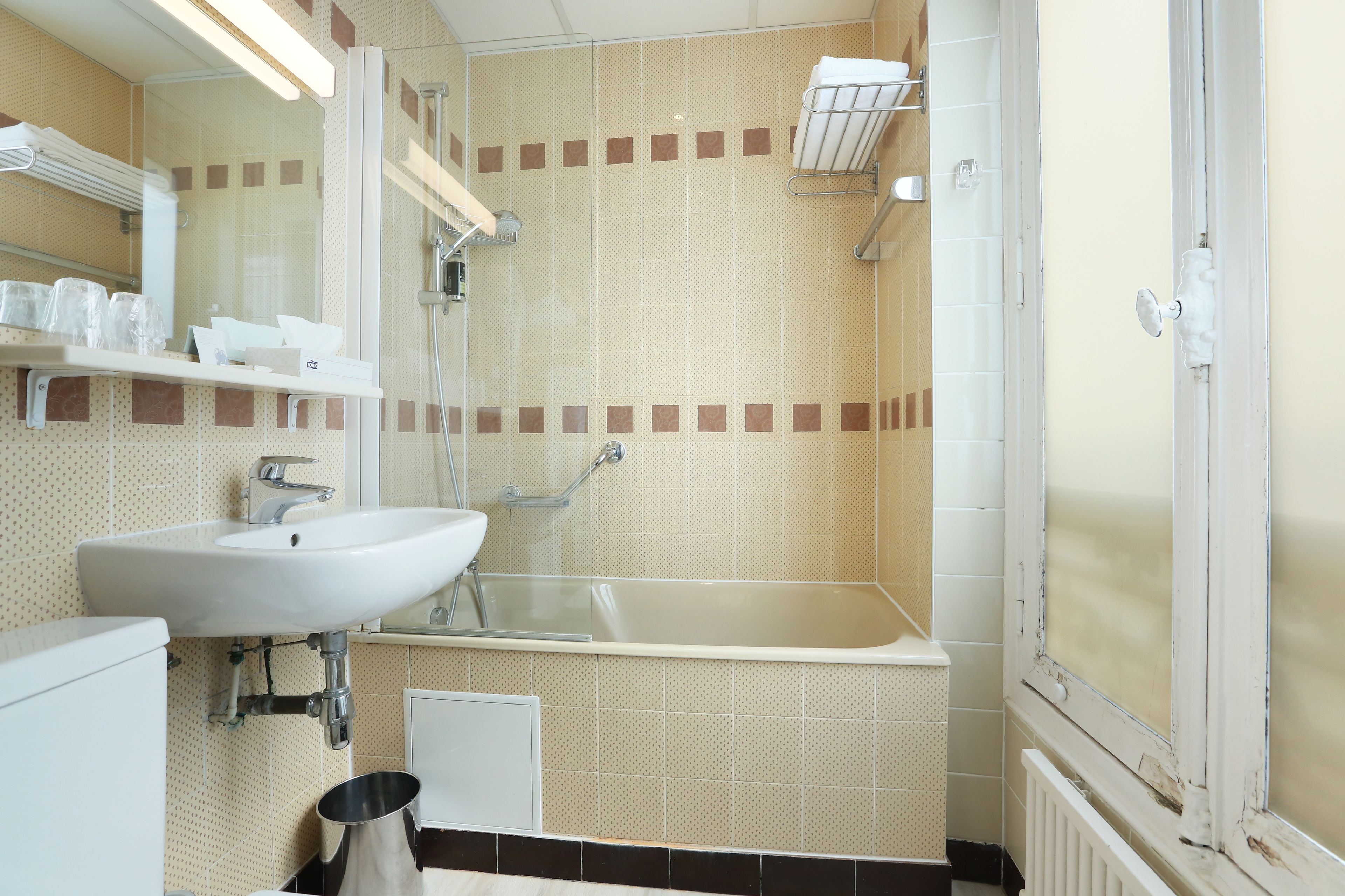 hair dryer, towels, soap, toilet paper