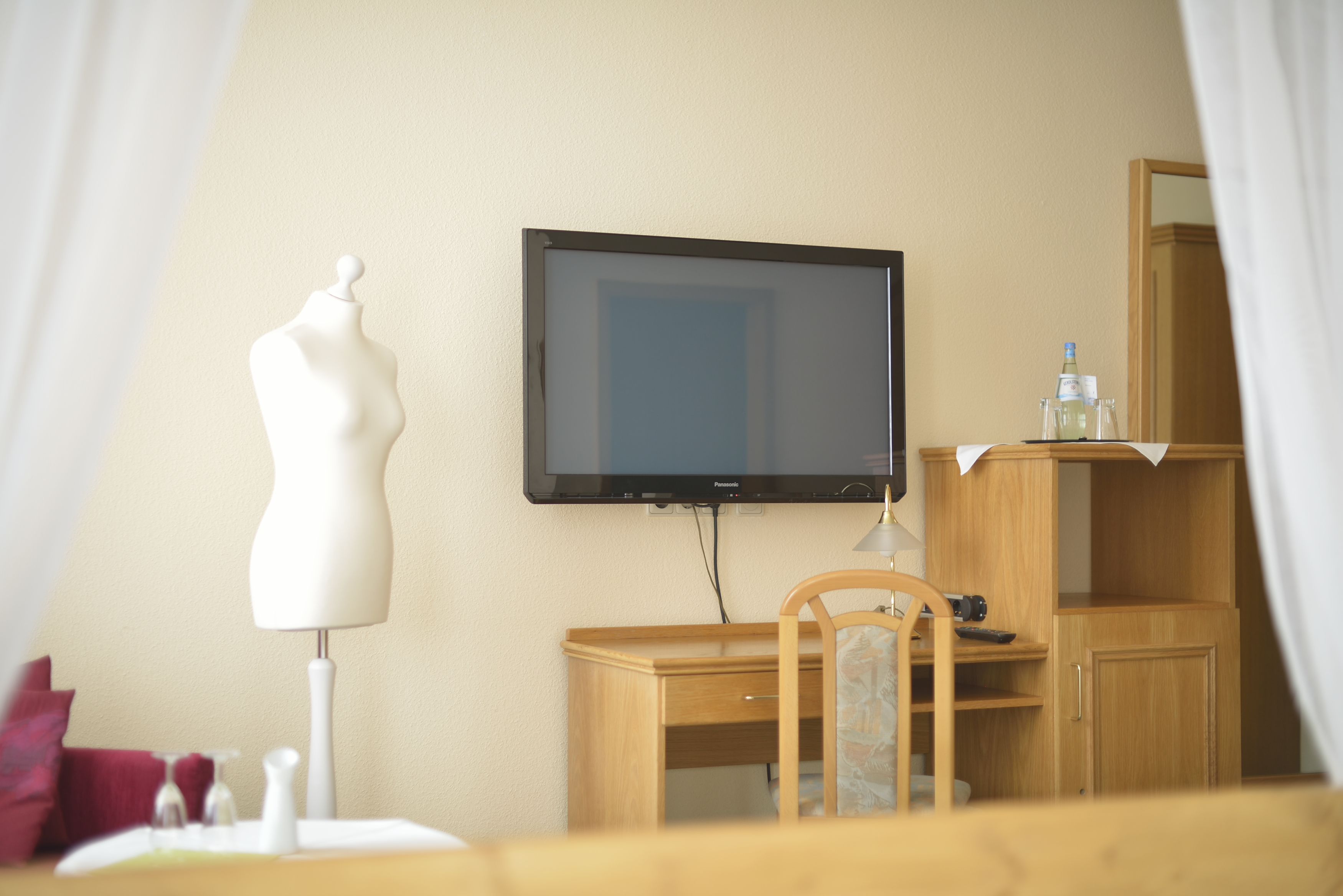 standard double room | living area | flat-screen tv