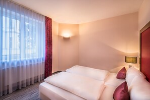 Desk, blackout curtains, free WiFi, alarm clocks