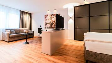 Deluxe Studio | 1 bedroom, premium bedding, in-room safe, individually decorated