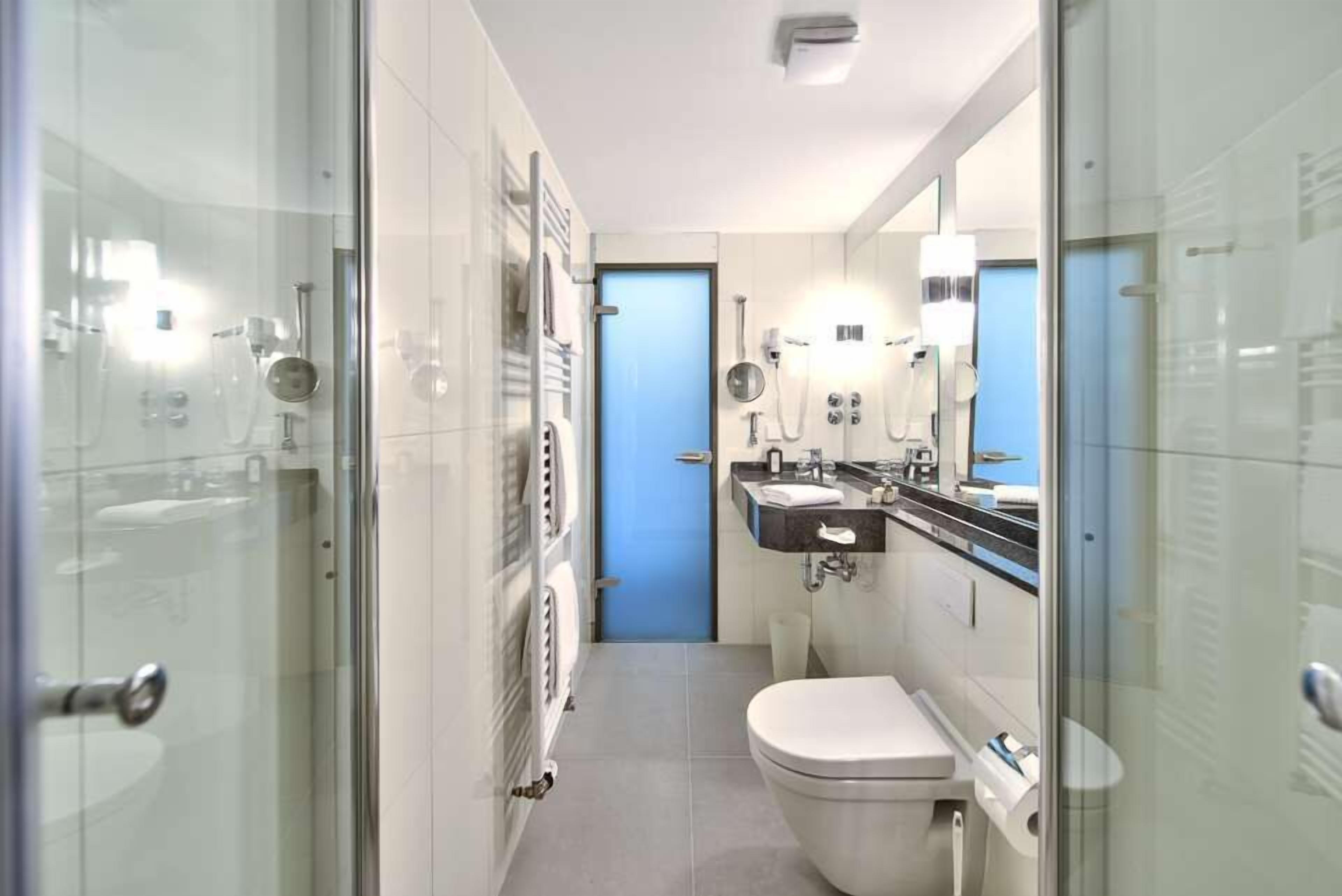 comfort double room | bathroom | shower, hair dryer, soap, shampoo