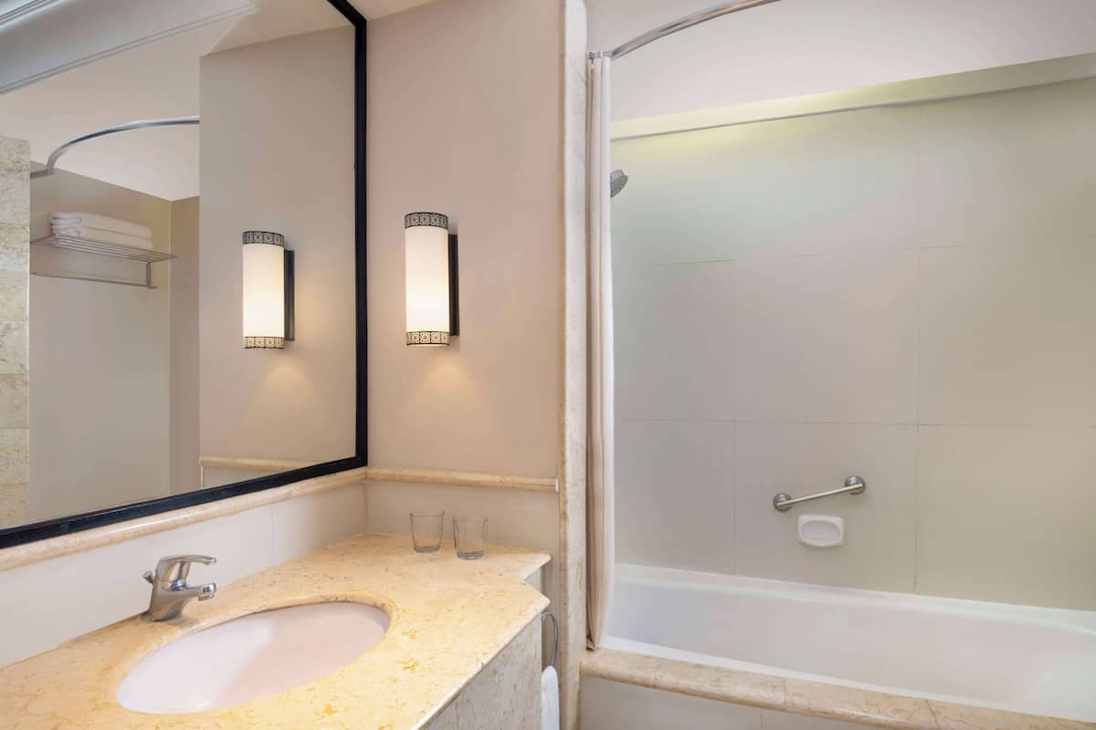 rainfall showerhead, hair dryer, bathrobes, slippers