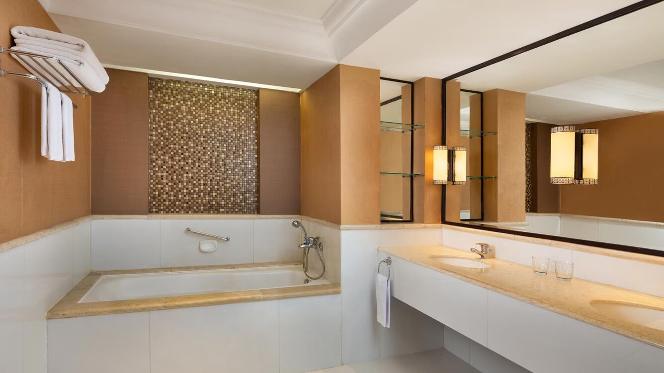 rainfall showerhead, hair dryer, bathrobes, slippers