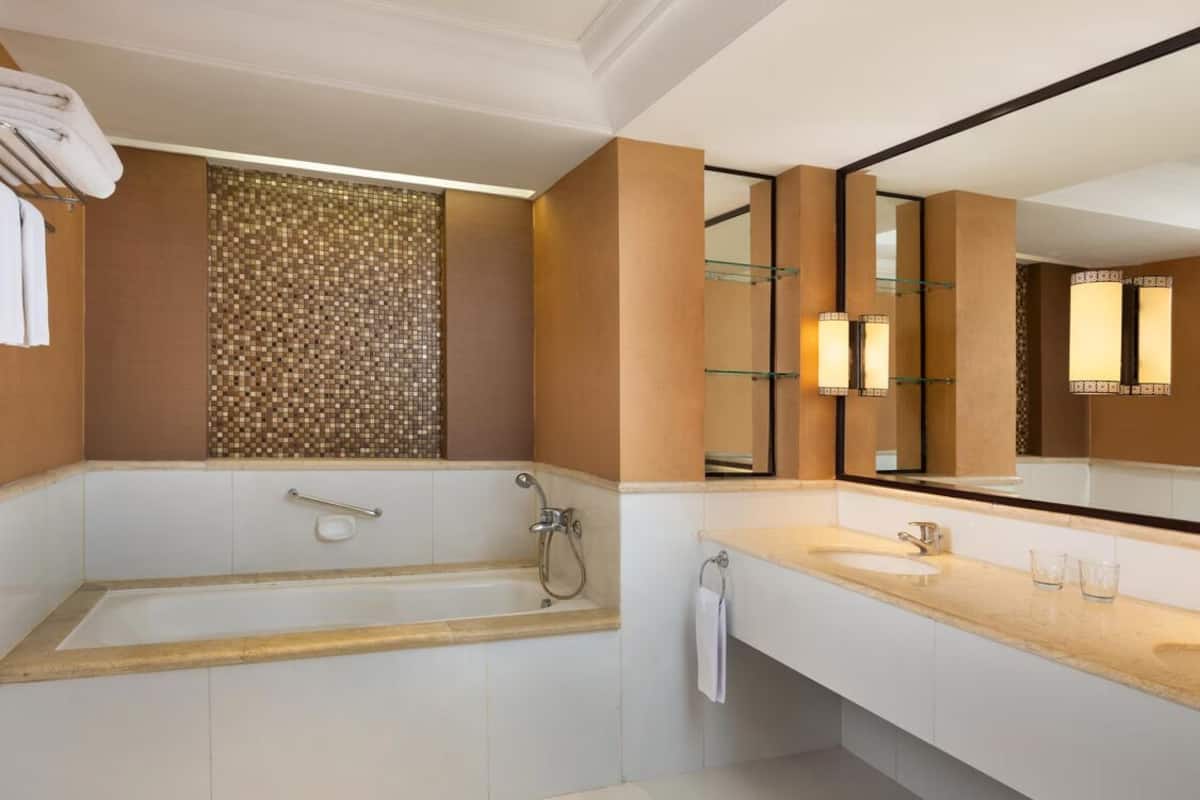 rainfall showerhead, hair dryer, bathrobes, slippers