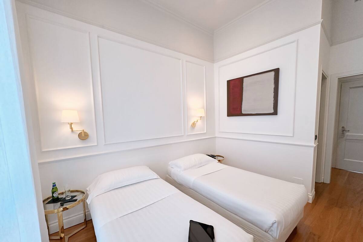 Premium bedding, down comforters, desk, laptop workspace
