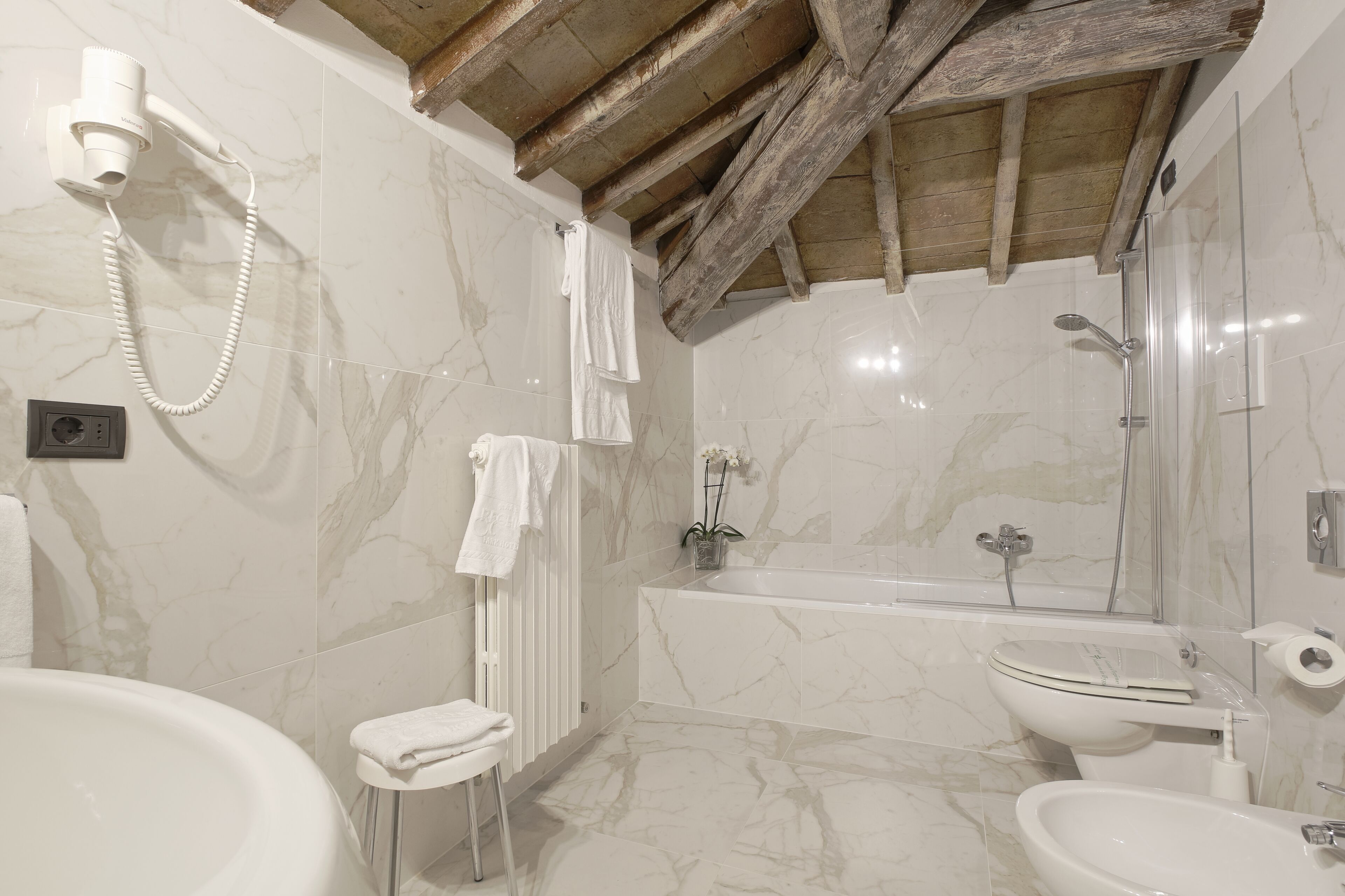 free toiletries, hair dryer, slippers, bidet