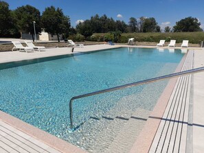 Seasonal outdoor pool, open 7:00 AM to 8:00 PM, sun loungers