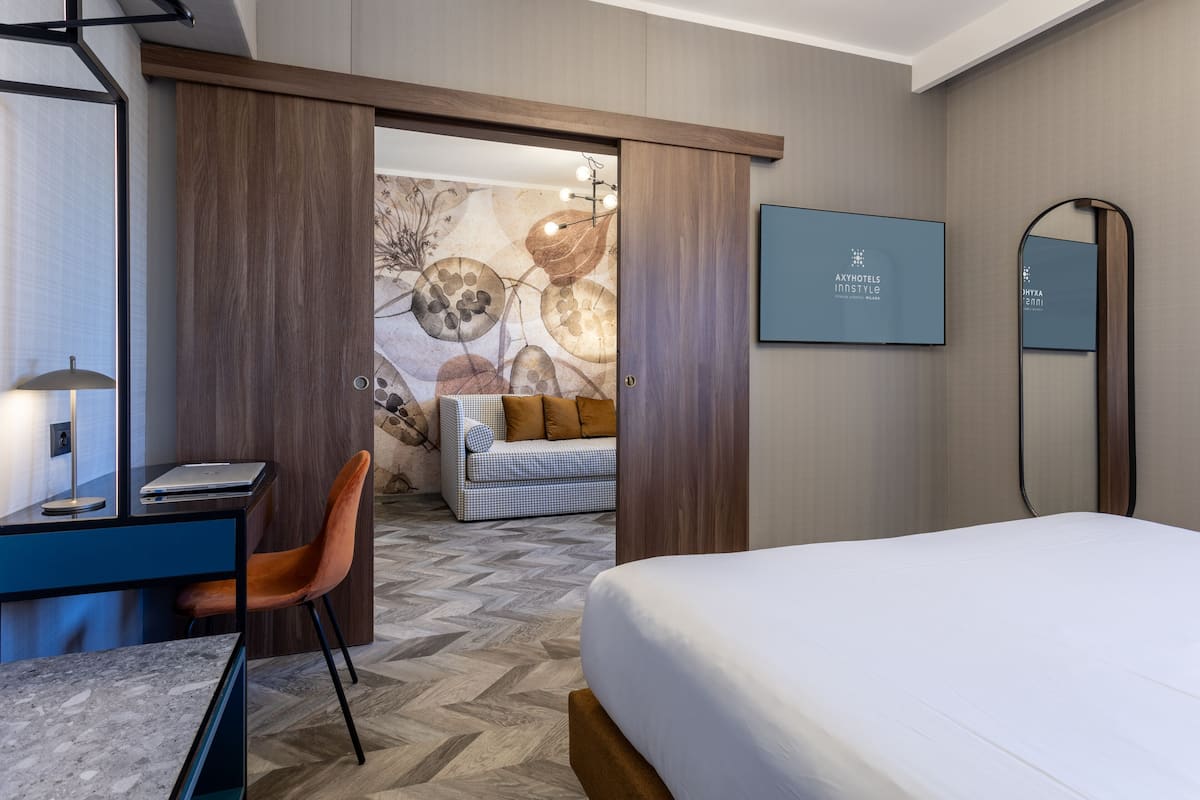Suite junior | 1 habitación, edredón y artículos del minibar gratis