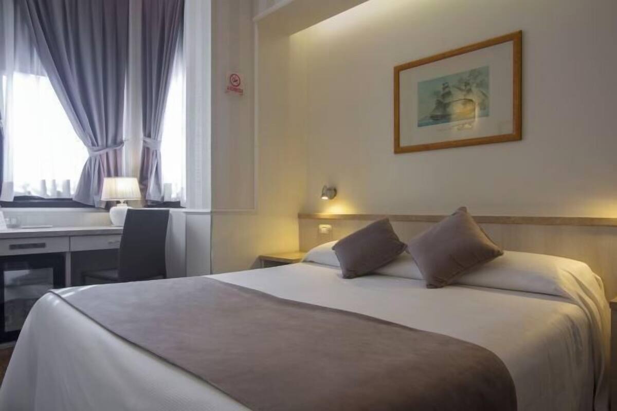 Premium bedding, down comforters, minibar, in-room safe