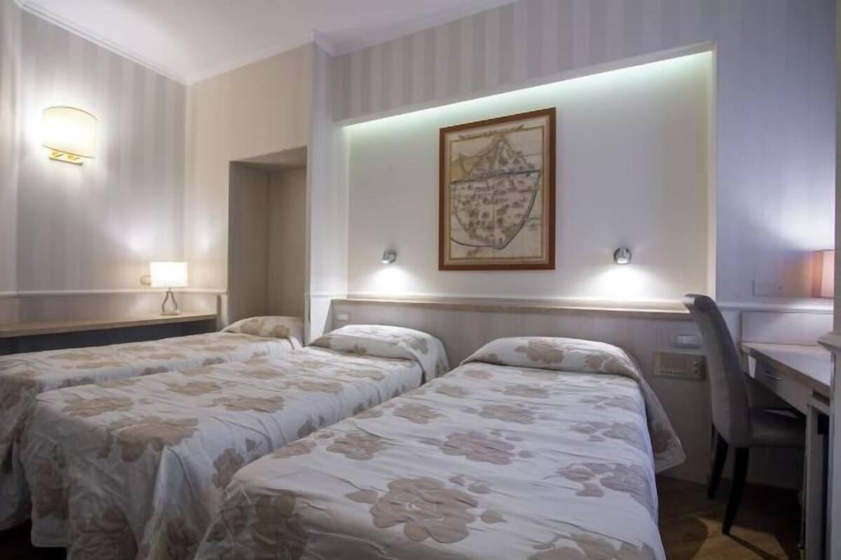 Premium bedding, down comforters, minibar, in-room safe