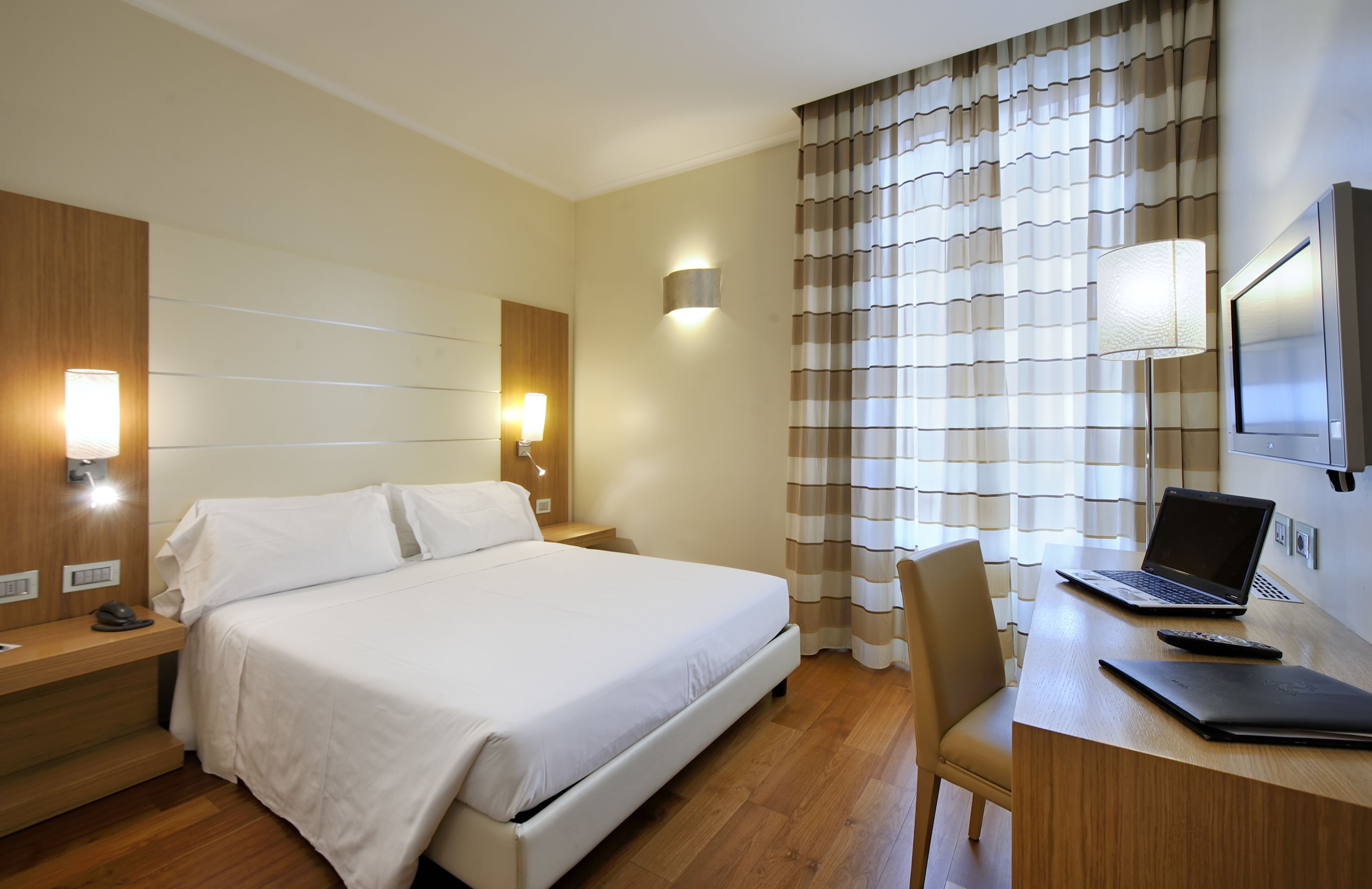 down duvets, memory-foam beds, minibar, in-room safe