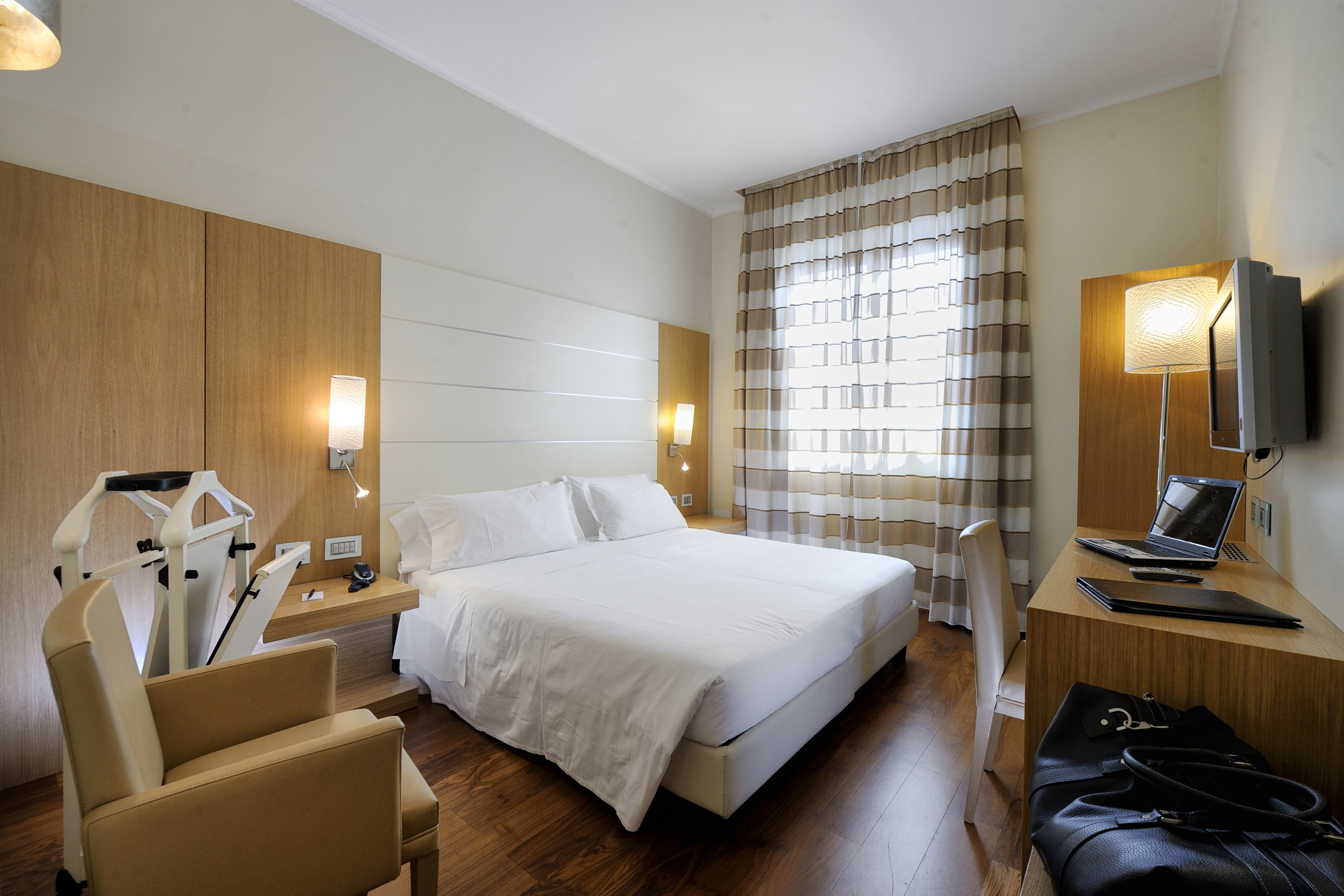 double or twin room | down duvets, memory-foam beds, minibar, in-room safe