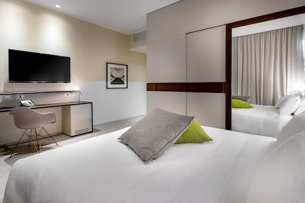 Donsdekens, een minibar, een kluis op de kamer, individueel gemeubileerd