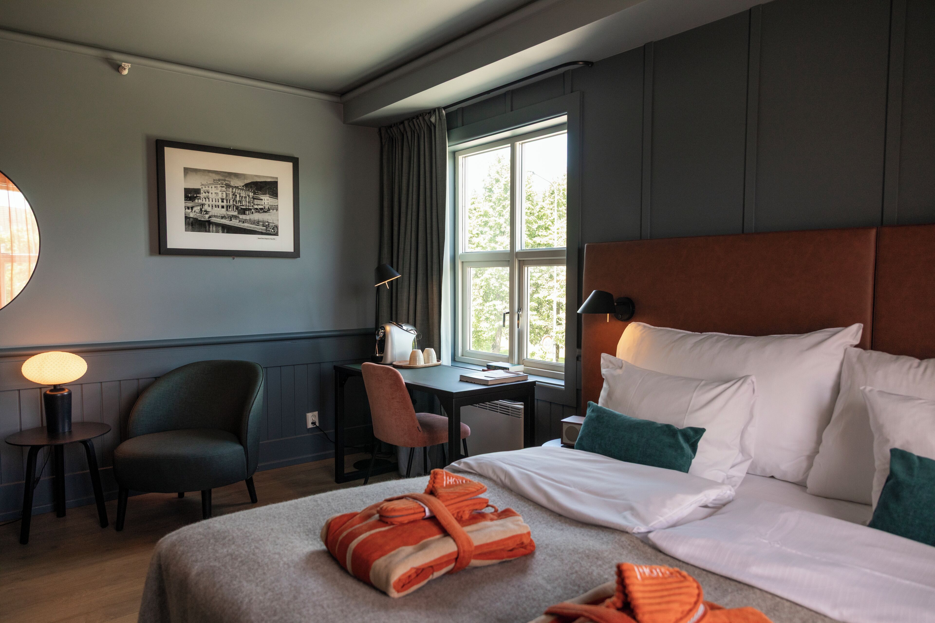 deluxe double room, 1 double bed, non smoking | in-room safe, desk, laptop workspace, iron/ironing board