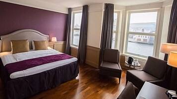 Pillowtop beds, desk, blackout drapes, iron/ironing board