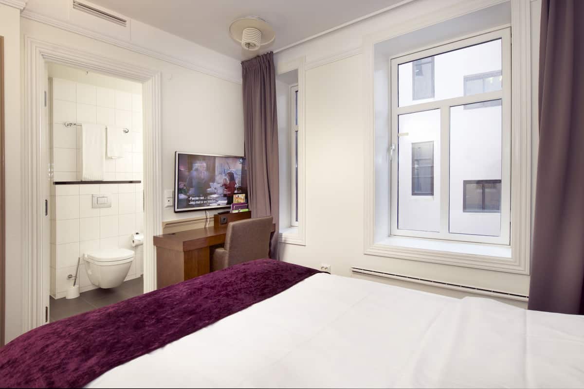 single room (compact) | pillow-top beds, blackout curtains, iron/ironing board, cots/infant beds