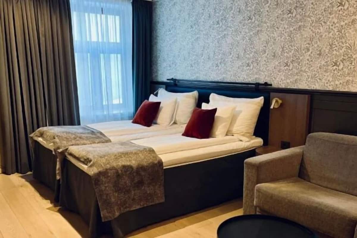 Pillow-top beds, in-room safe, desk, iron/ironing board