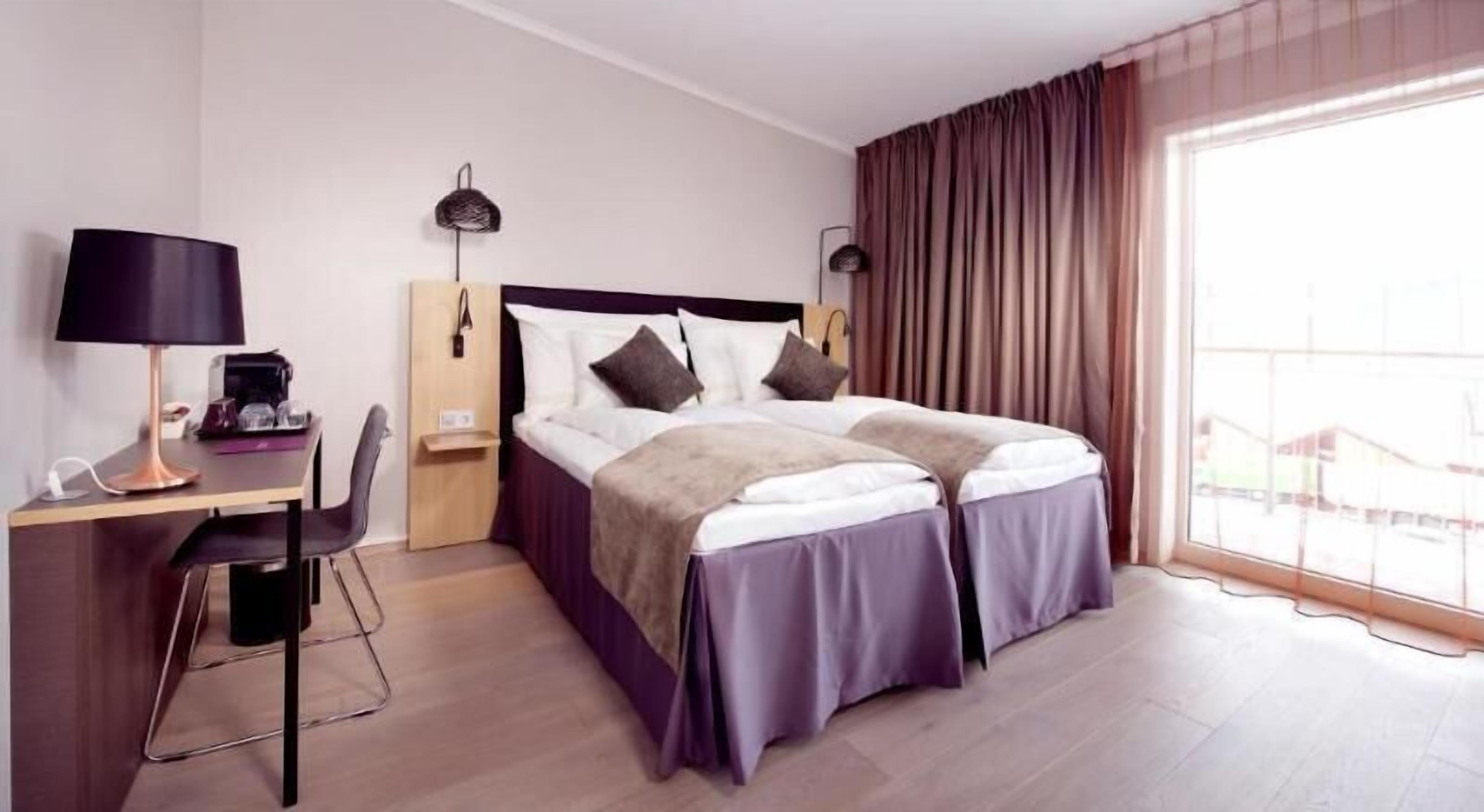 Pillow-top beds, in-room safe, desk, iron/ironing board