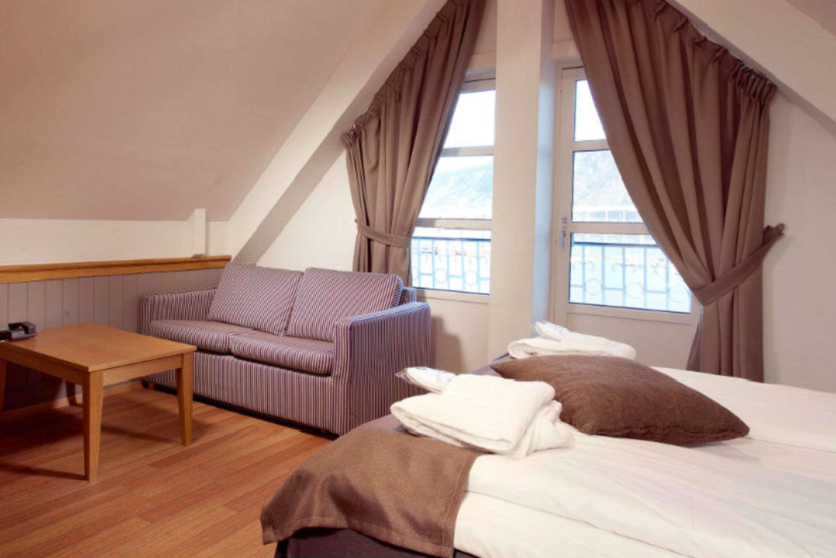 desk, laptop workspace, blackout curtains, free wifi