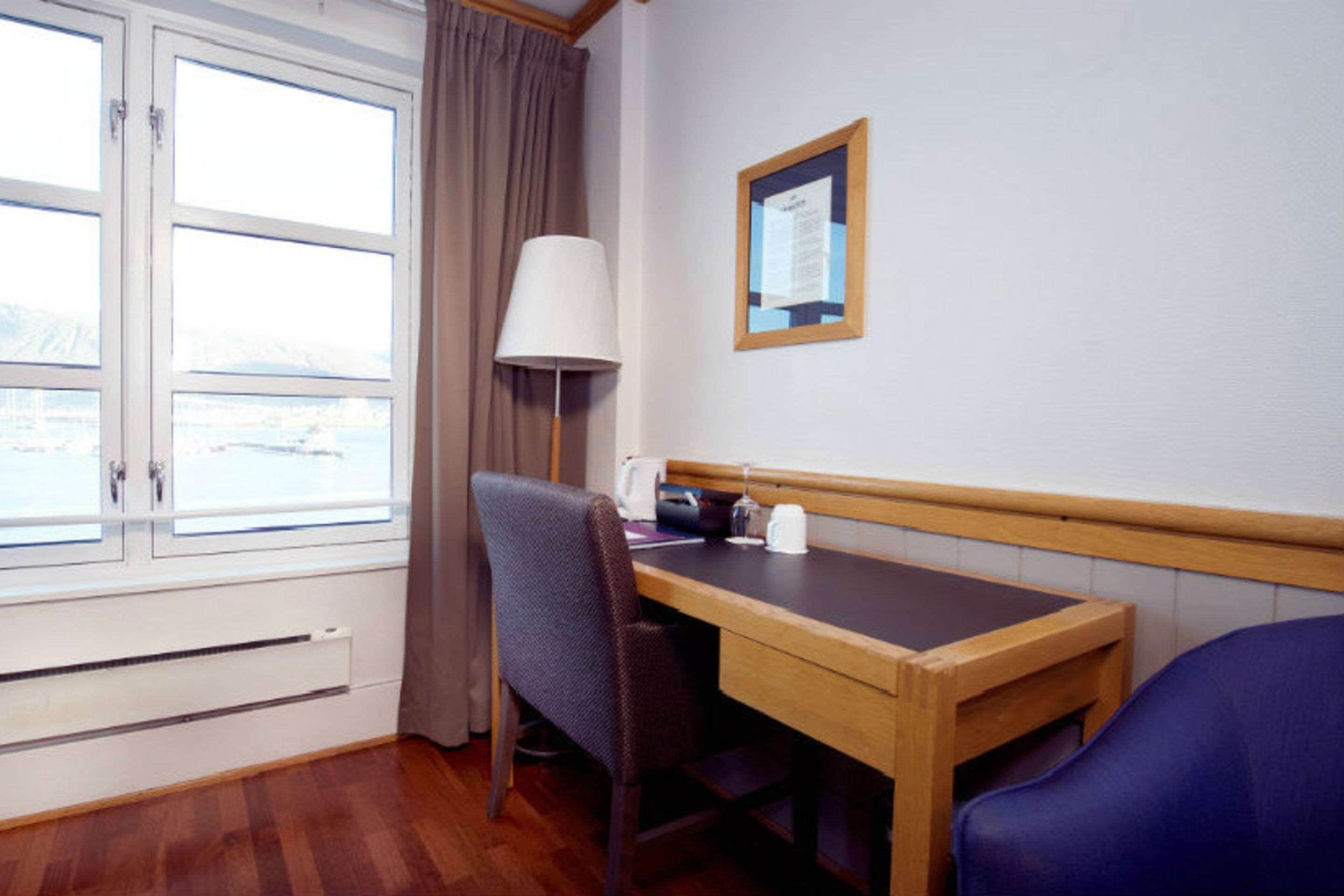 desk, laptop workspace, blackout curtains, free wifi