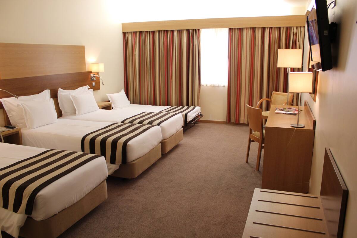 Ropa de cama de alta calidad y minibar