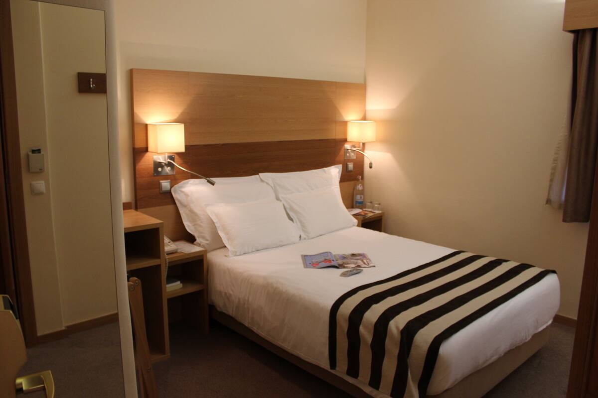 Ropa de cama de alta calidad y minibar