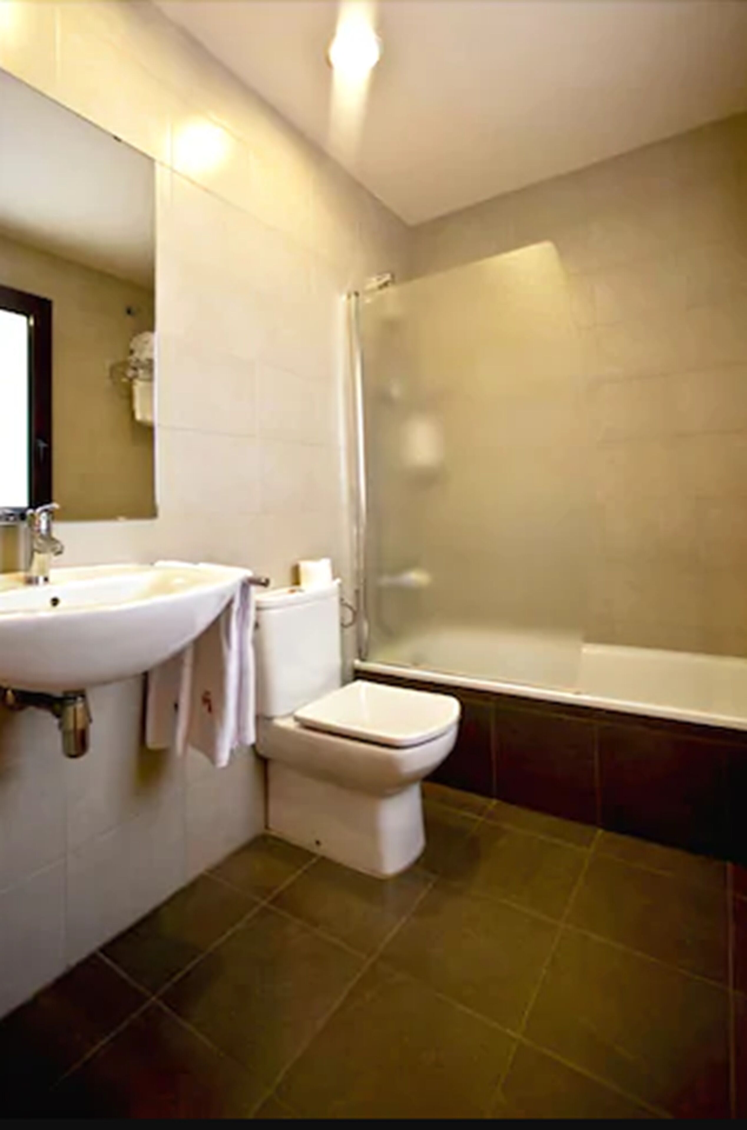 rainfall showerhead, hair dryer, towels, soap