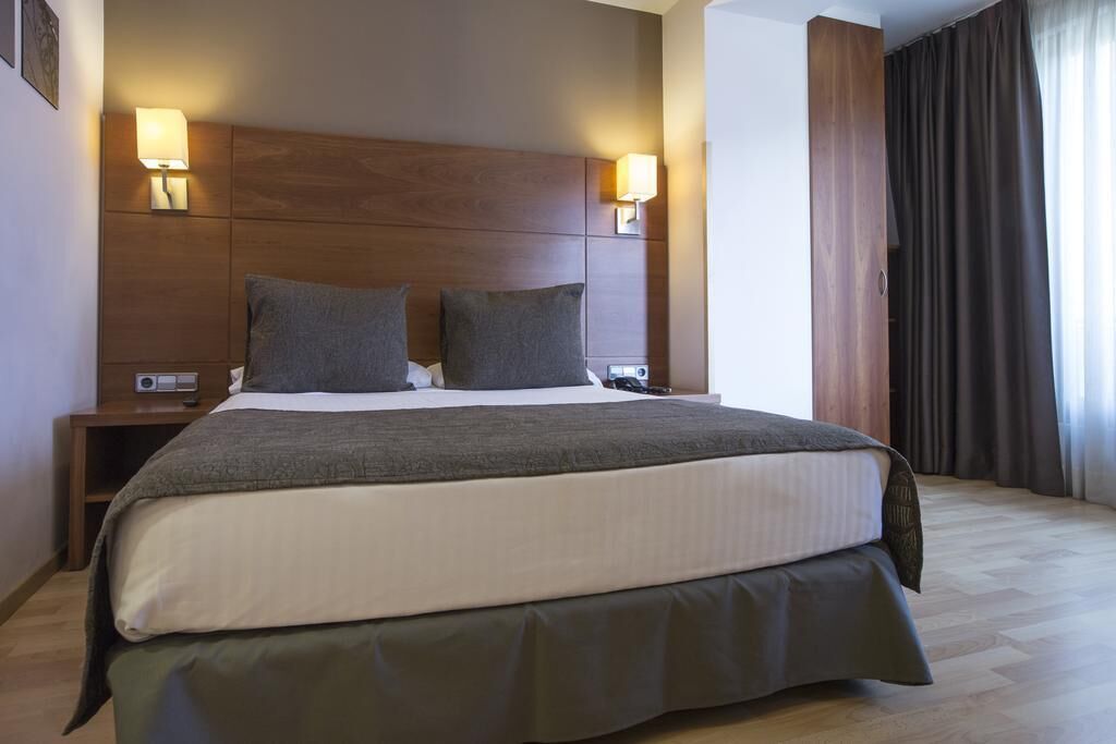 Down duvets, memory-foam beds, in-room safe, desk