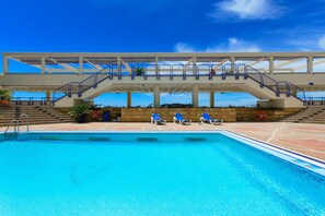Outdoor pool, sun loungers