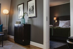 Desk, laptop workspace, cots/infant beds, rollaway beds