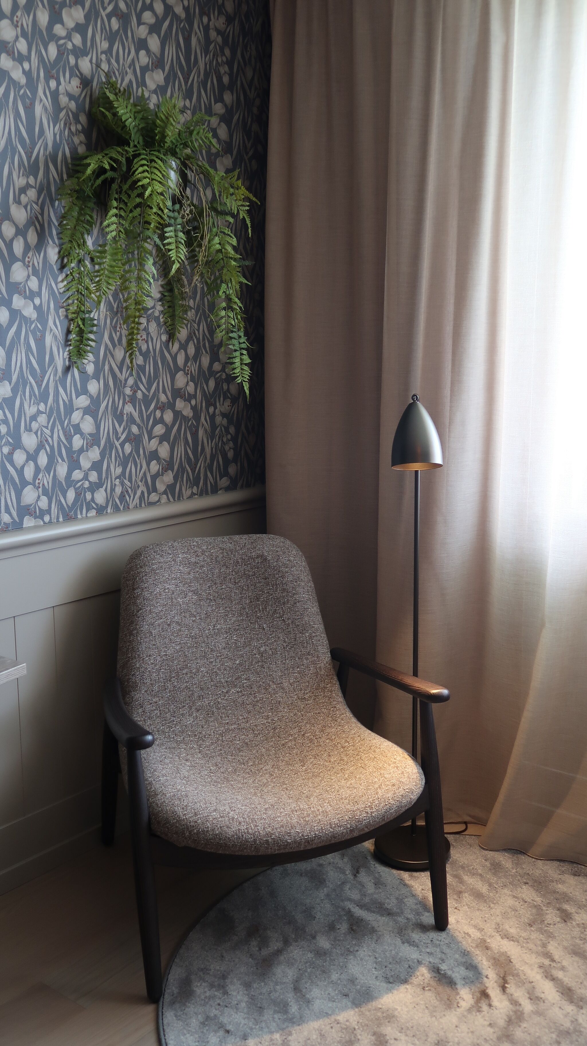 desk, laptop workspace, iron/ironing board, bed sheets