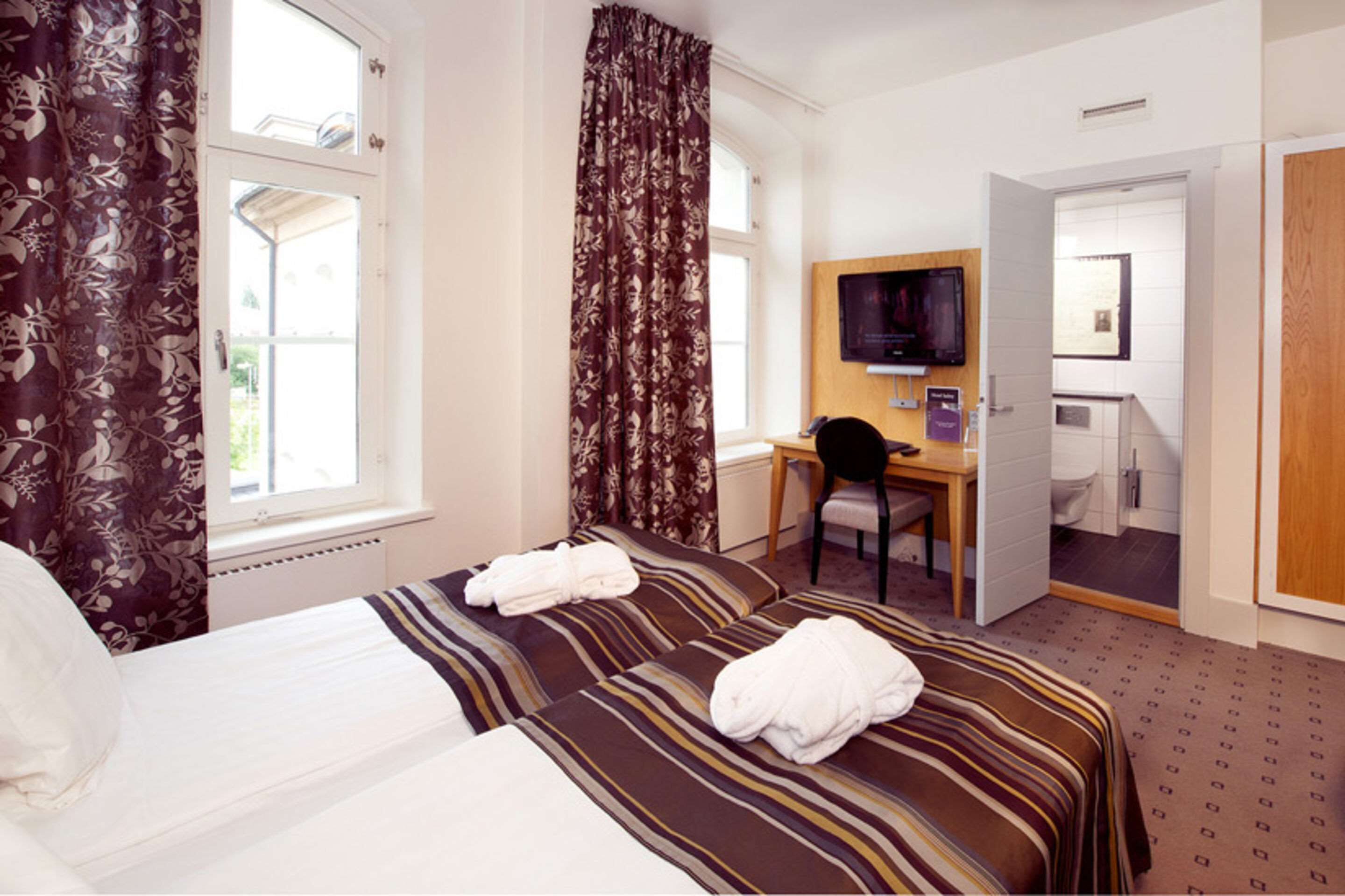 in-room safe, desk, iron/ironing board, cots/infant beds