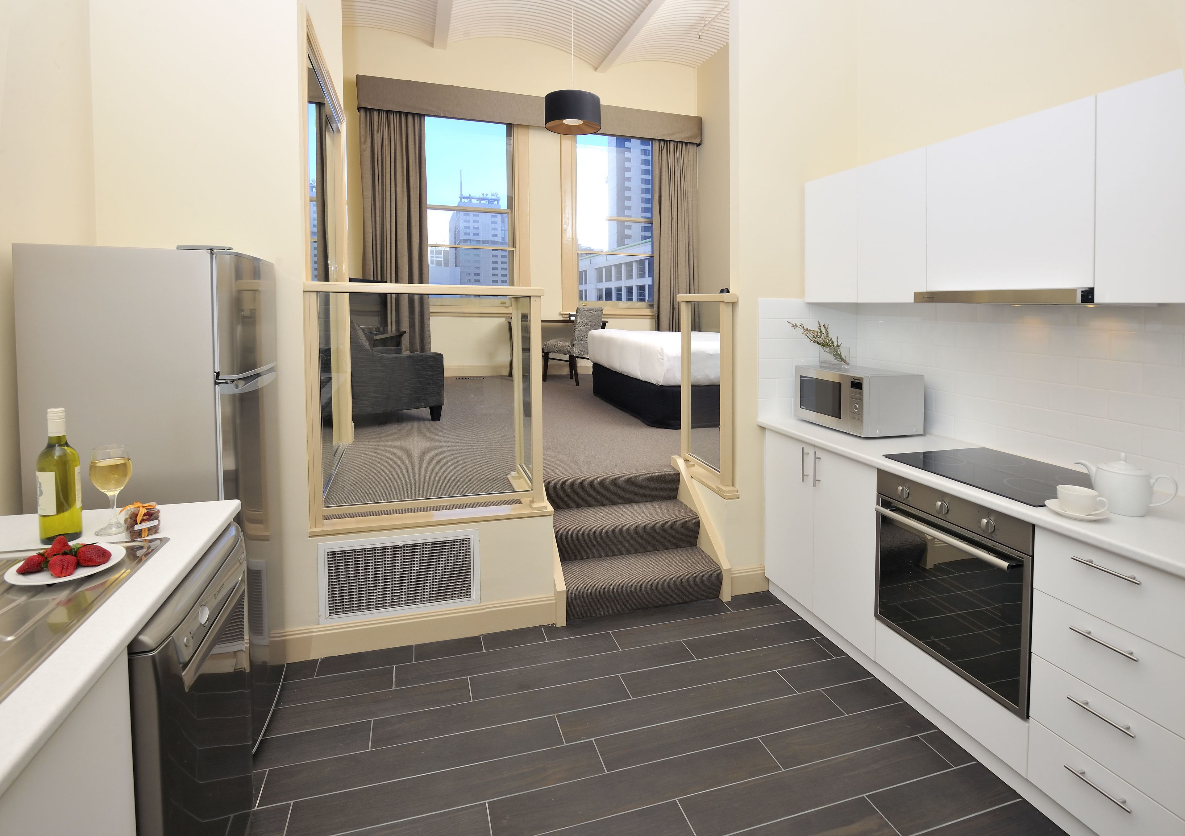 executive studio apartment | private kitchen | fridge, microwave, oven, stovetop