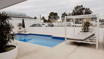 Outdoor pool, sun loungers