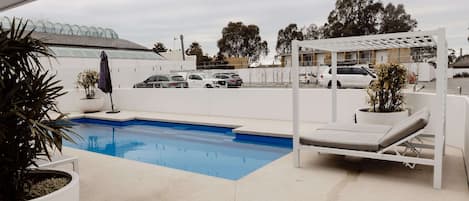 Outdoor pool, sun loungers