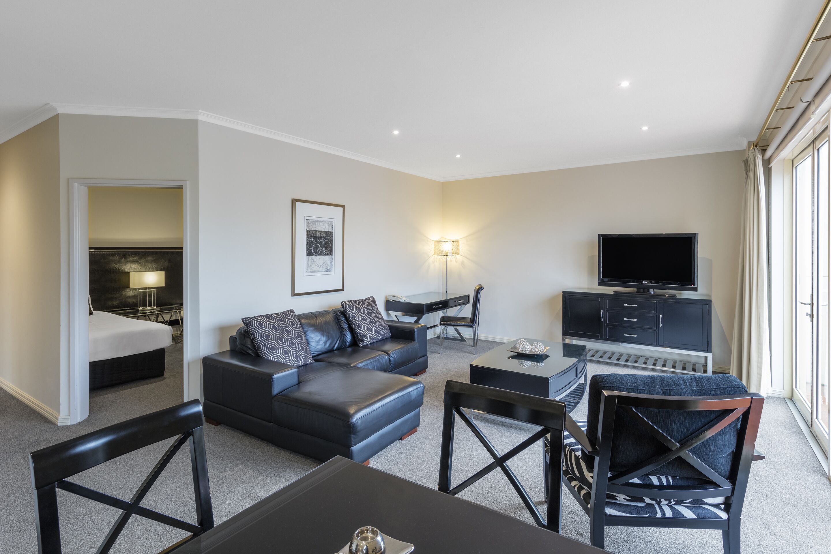 2 bedroom apartment | living area | 55-inch lcd tv with satellite channels, tv, netflix