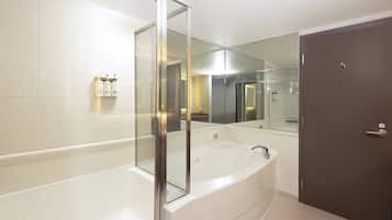 Suite, 1 King Bed with Sofa bed | Bathroom | Combined shower/bathtub, eco-friendly toiletries, hair dryer, towels