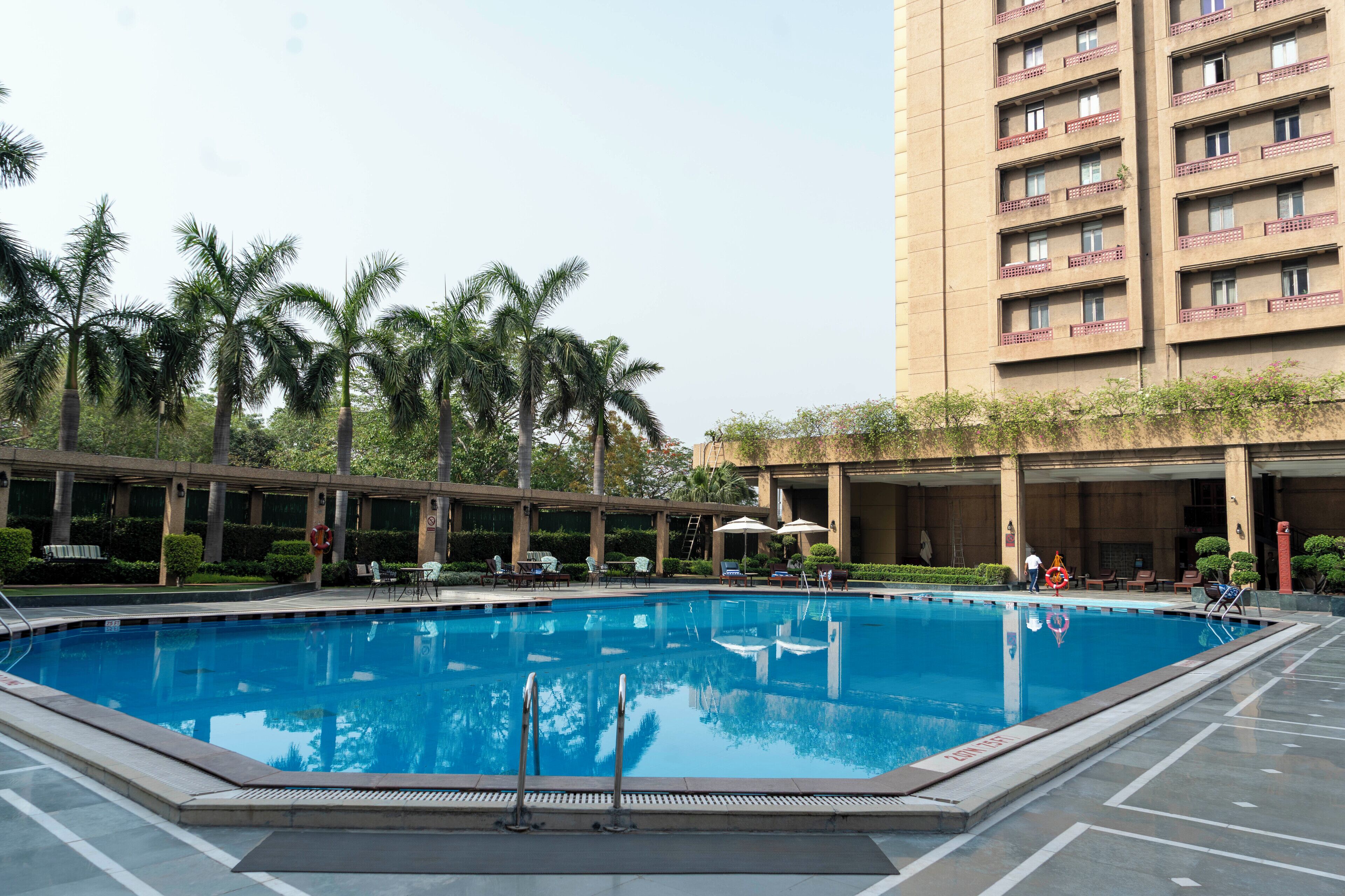 Outdoor pool, open 6:00 AM to 8:00 PM, sun loungers