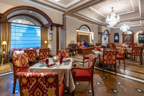Breakfast, lunch served; local and international cuisine, garden views