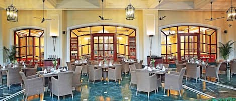 Breakfast, lunch served; local and international cuisine, garden views