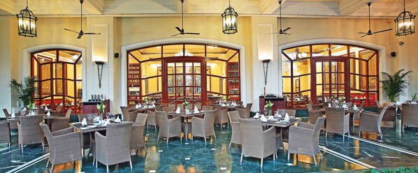 Breakfast, lunch served; local and international cuisine, garden views 