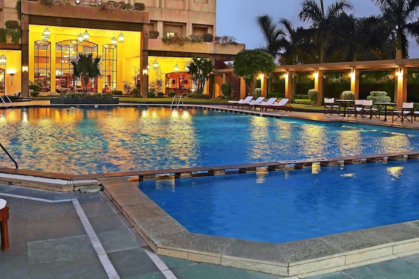 Outdoor pool, open 6:00 AM to 8:00 PM, sun loungers