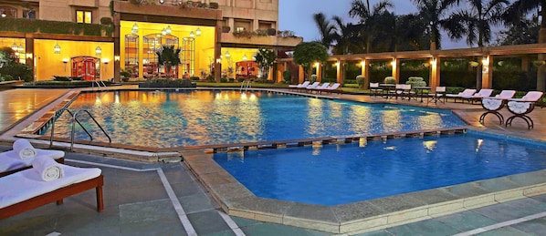 Outdoor pool, open 6:00 AM to 8:00 PM, sun loungers