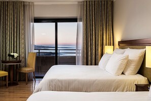 Family Room, Balcony, Sea View | Premium bedding, minibar, in-room safe, desk