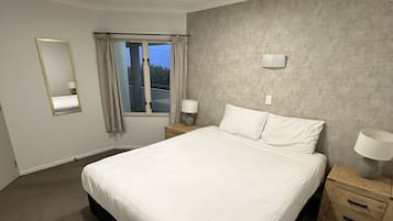 1 bedroom, premium bedding, laptop workspace, iron/ironing board