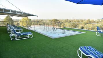 Outdoor pool, sun loungers