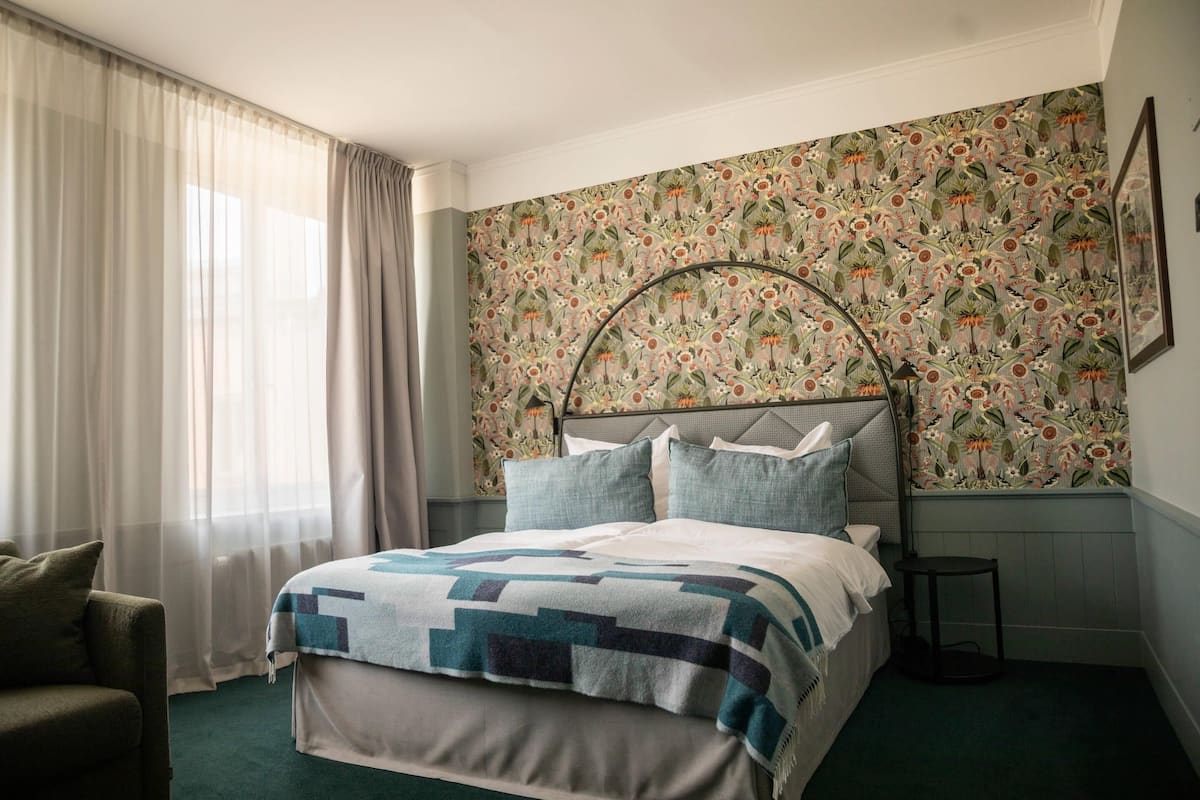 Family Room | Iron/ironing board, cots/infant beds, bed sheets, alarm clocks