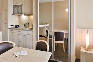 Studio, 1 Double Bed, Balcony | Living room | TV